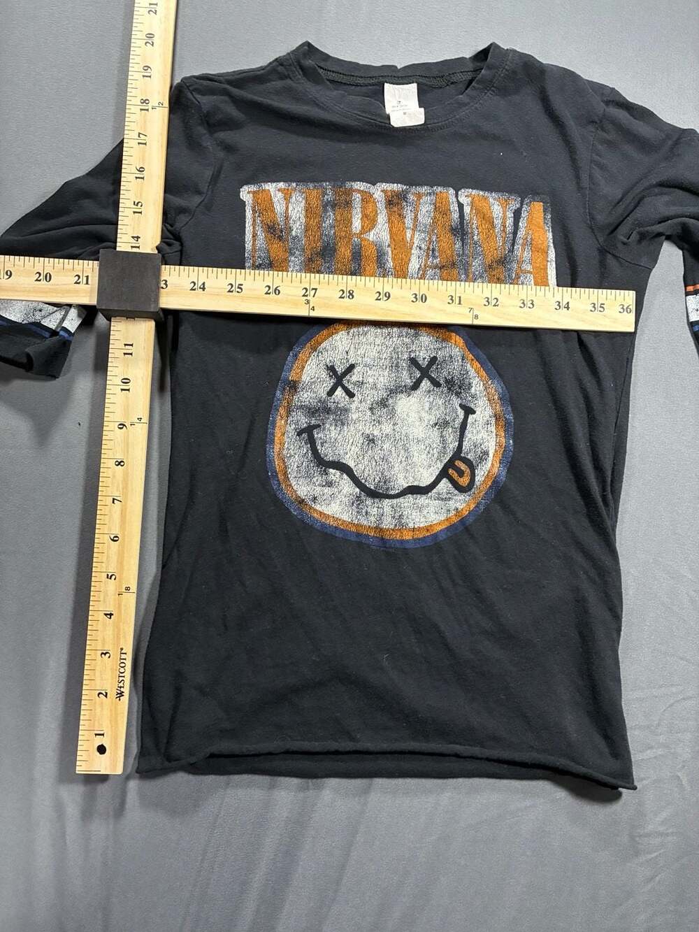 Nirvana Smiley Face Graphic T-Shirt with Striped Sleeves